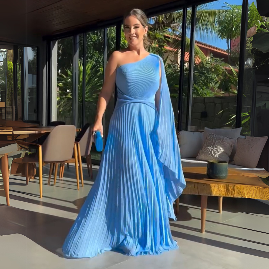 Abito Lungo Asimmetrico Plissettato – Eleganza Dinamica