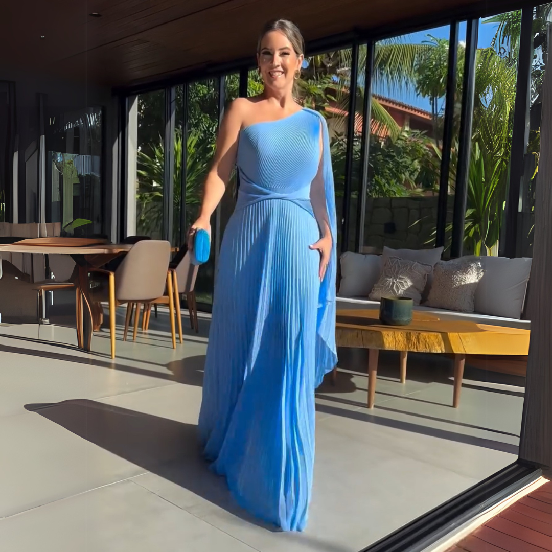 Abito Lungo Asimmetrico Plissettato – Eleganza Dinamica