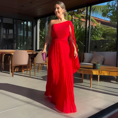 Abito Lungo Asimmetrico Plissettato – Eleganza Dinamica