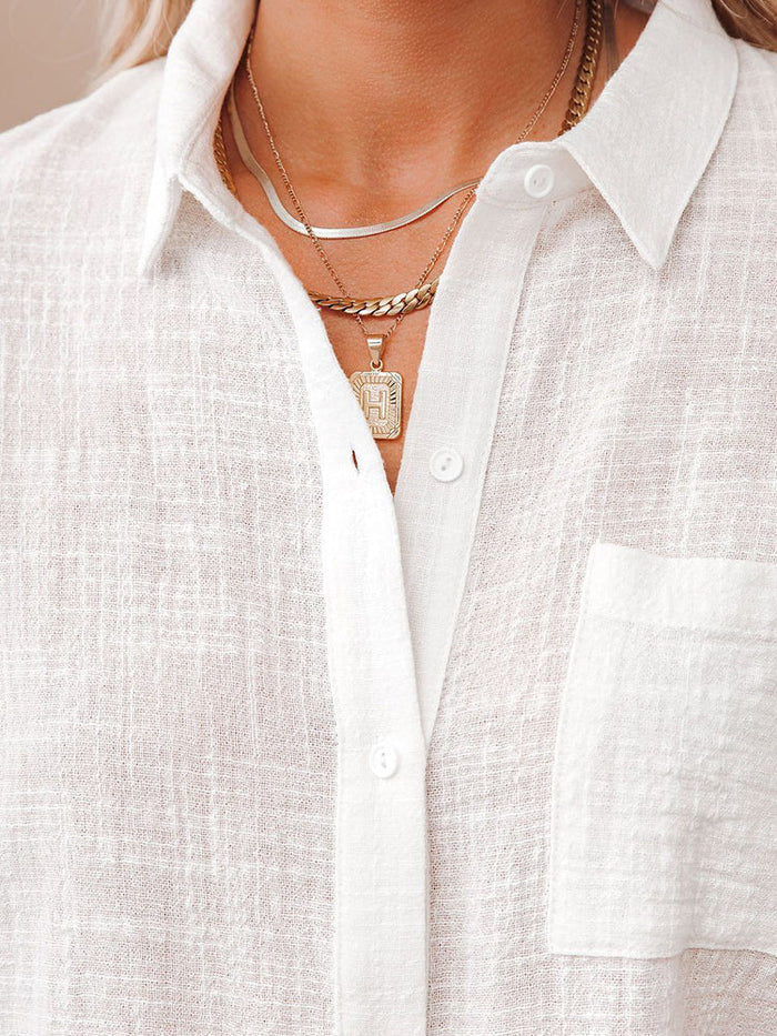 "Camicia Donna in Lino a Maniche Corte" can be rewritten as "Camicia Estiva Donna in Lino a Maniche Corte".
