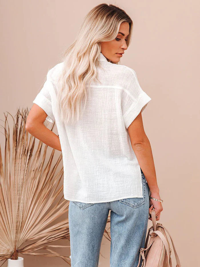 "Camicia Donna in Lino a Maniche Corte" can be rewritten as "Camicia Estiva Donna in Lino a Maniche Corte".