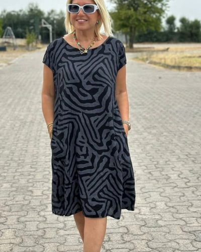 Abito Estivo Lungo Safari Chic con Stampa Zebra e Tasche Laterali